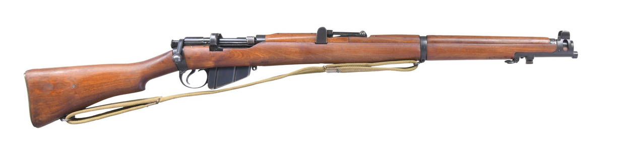 BRITISH NO. 2 MKIV ENFIELD TRAINING RIFLE.: Cal. 22 LR. S# W97944. Bbl. 25 1/2". Blade front sight. Tangent rear sight graduated to 2000m. Matching numbers on receiver & top of bolt handle. Other visible parts appear unnumbered. Standard SMLE M