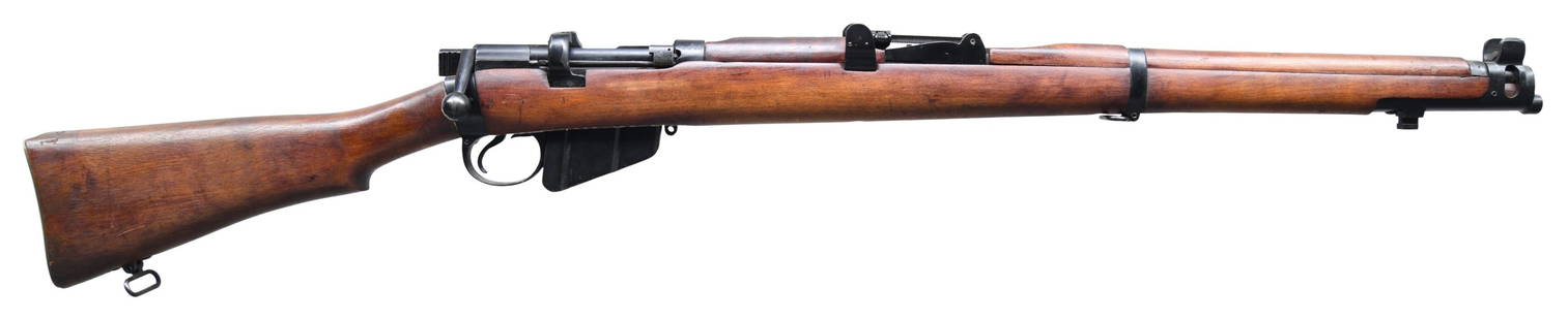 BRITISH ENFIELD MKIV BOLT ACTION TRAINING RIFLE.: Cal. 22 LR. S# B5872. Bbl. 25 1/5" marked with BSA rifle logo. Blade front sight with protective ears. Tangent rear sight graduated to 2000m but is pinned to its lowest setting. All visible matching n