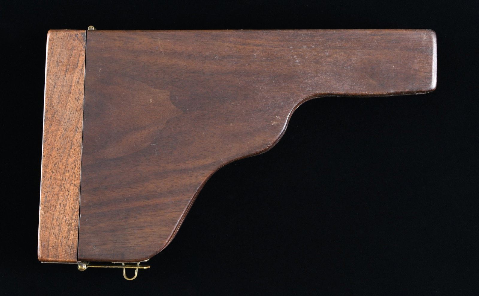 WOOD LUGER CASE WITH INTRIGUING PLAQUE.: Custom made Luger pistol case. Case conforms to the outline of a Luger pistol, featuring a brass hinge and latch. Top of the lid features a brass plaque which reads "UNSEREM KOMPANIE - FUHRER/ OBERLT.