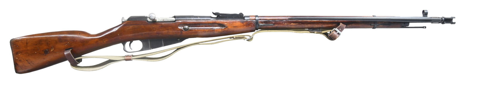 WW2 SOVIET 91/30 MOSIN NAGANT BOLT ACTION RIFLE.: Cal. 7.62x54R. S# 9130-1800. Bbl. 29". Post front sight with hood . Tangent rear sight graduated to 2000m. All matching numbers as arsenal refurbished. Bbl. shank has Izhevsk markings with 1942 date.