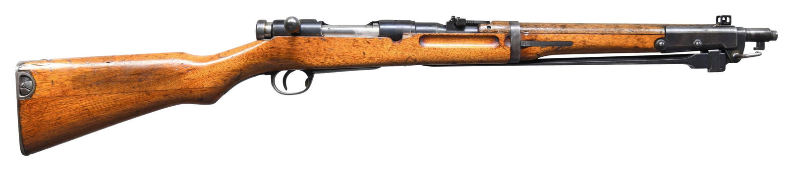 WW2 JAPANESE NAGOYA TYPE 44 ARISAKA BOLT ACTION: CARBINE. Cal. 6.5 Jap. S# 2610. Bbl. 19 1/4". Blade front sight with protective ears. Ladder rear sight graduated to 2000m. Matching numbers on receiver, bayonet assembly & floorplate. Bolt is mismatc