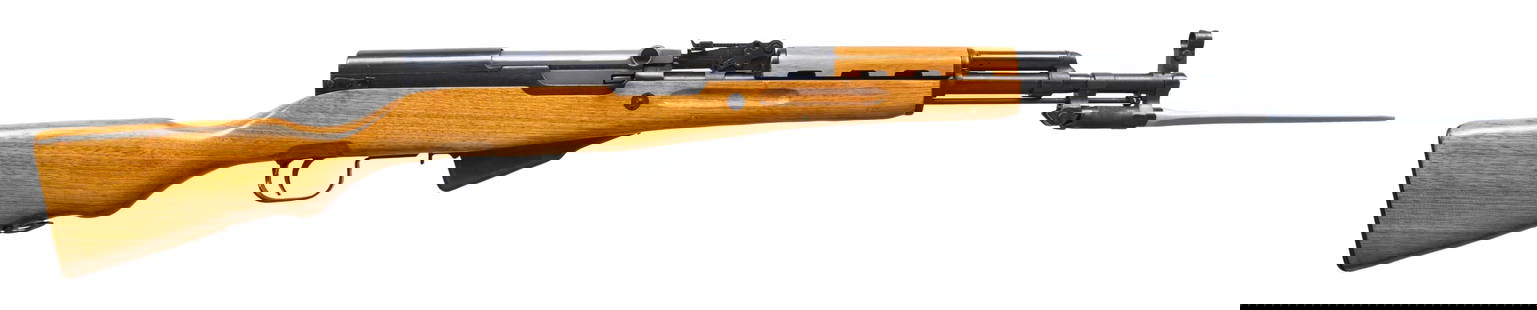 NORINCO MODEL SKSS PARATROOPER STYLE SEMI-AUTO: RIFLE. Cal. 7.62x39. S# 9232541. Numbers match on receiver, bolt & buttstock. Bbl. 16 5/8". Import marked on left side of receiver. Receiver markings include "MOD. SKSS 7.62X39MM / MADE IN CHINA BY NO