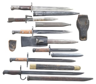 GROUPING OF SIX BAYONETS AND ONE LEATHER FROG.
