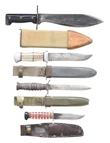 GROUPING OF FOUR INTERESTING US MILITARY KNIVES.