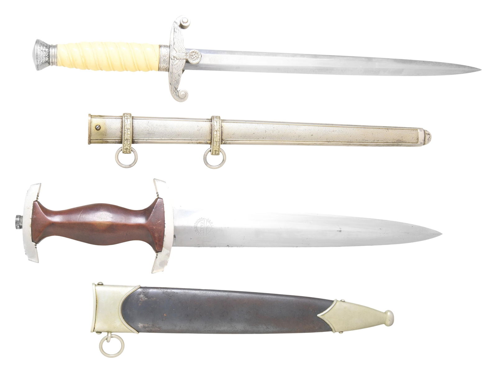 2 WWII GERMAN DAGGERS.: 1) NSKK. A good example of an NSKK dagger measuring 14 3/4" overall with an engraved blade that reads "Alles fur Deutschland". The reverse is marked "C & R LINDER (logo) SOLINGEN-WEYER". Plated crossg