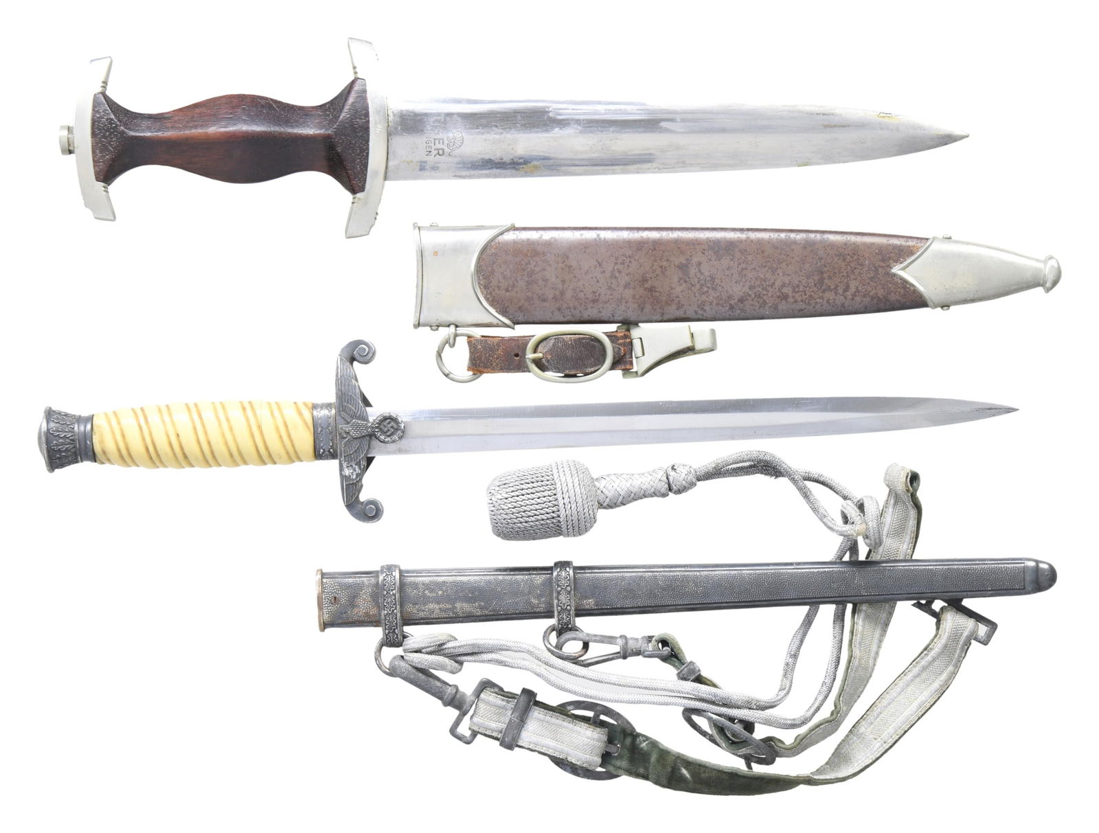 2 WWII GERMAN DAGGERS: 1) ARMY. This Army dagger measures 15 3/4" overall and has a plain blade marked on the reverse " (logo) TIGER SOLINGEN". Plated eagle crossguard with an oak leaf embellished pommel & ferrule. Cream co