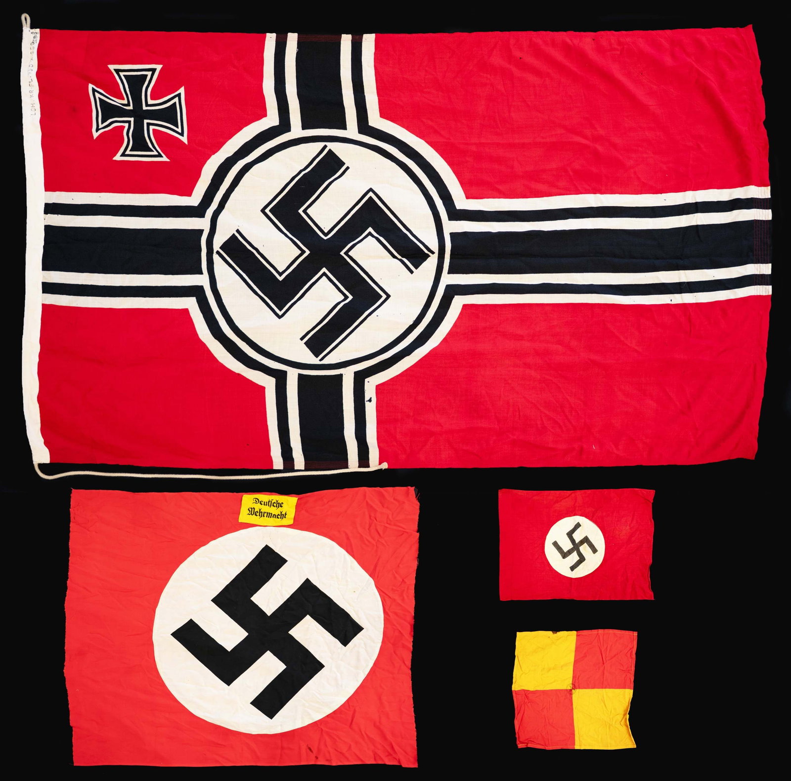 WWII GERMAN KRIEGSMARINE BATTLE FLAG, PARTY FLAGS,: AND MORE. This group includes 1 Kriegsmarine battle flag measuring approx. 96" x 58". The flag is of standard design with an internal rope halyard. The hoist is marked with a Kriegsmarine eagle over "