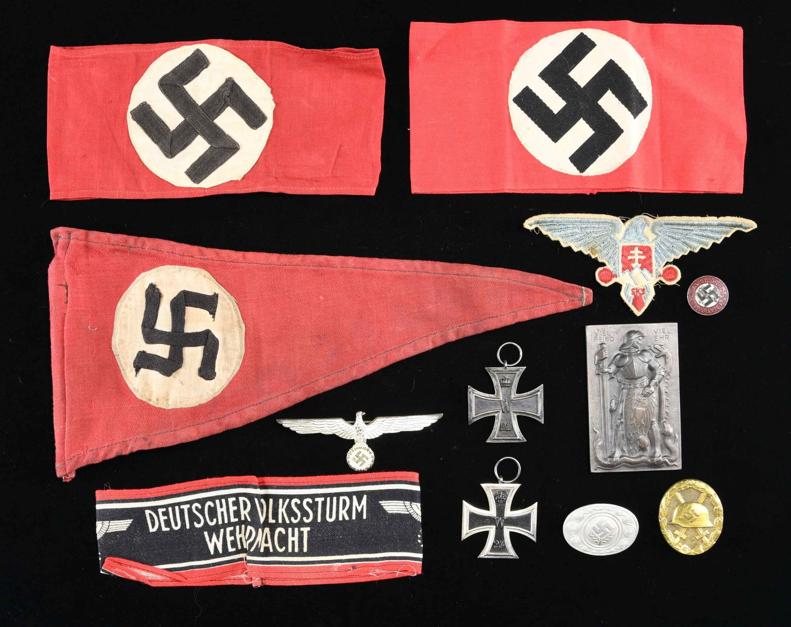 WWII GERMAN BADGES, ARMBANDS, MEDALS, AND MORE.: This lot consists of 2 Party armbands, / 1 Deutscher Volkstrum Wehrmacht workers armband, / 1 very early Party pennant measuring 12 1/2" in length, / 1 light blue and red Slovakian eagle with "SKS" be