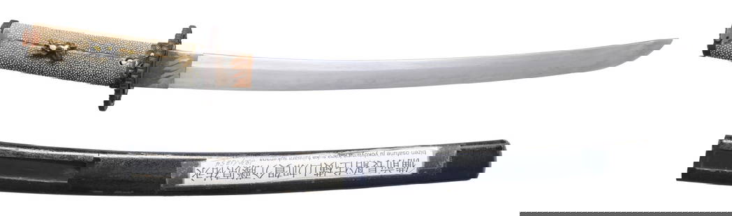 JAPANESE WAKIZASHI: Overall length: 20 3/4". Blade length 14 1/4". Blade has a very irregular hamon with a copper habaki showing diagonal spires. There is 1 seppa above and below the very ornate openwork iron tsuba. The