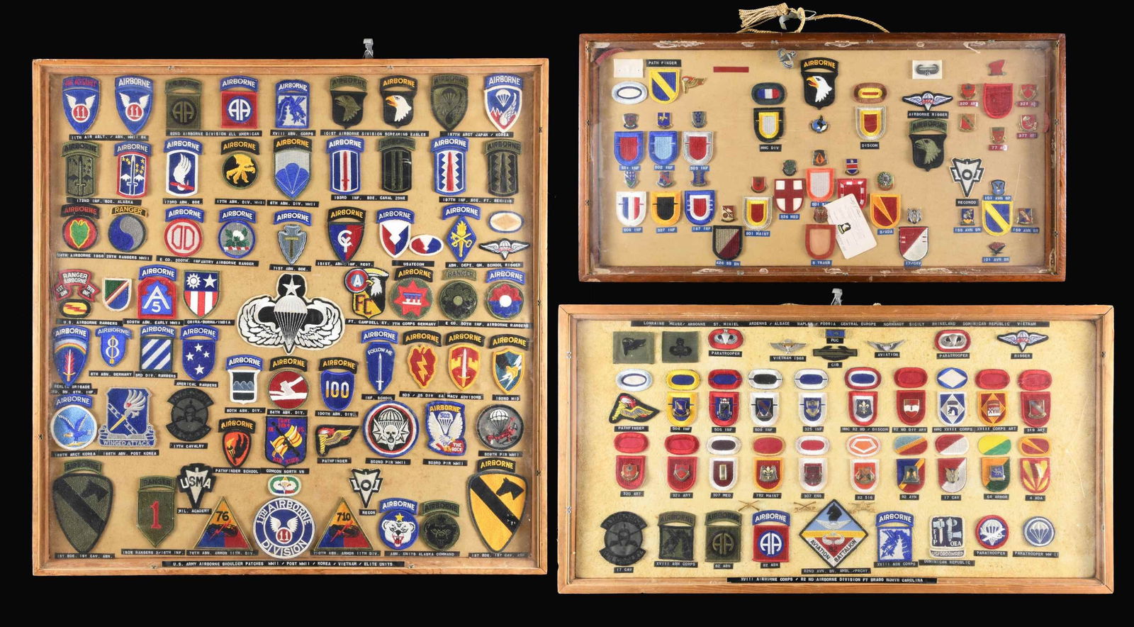 UNITED STATES AIRBORNE AND RELATED PATCHES: This very large collection of Airborne patches is displayed in 3 frames. The first frame has approx 69 Airborne patches from various divisions along with a large number of Airborne tabs. The second fr