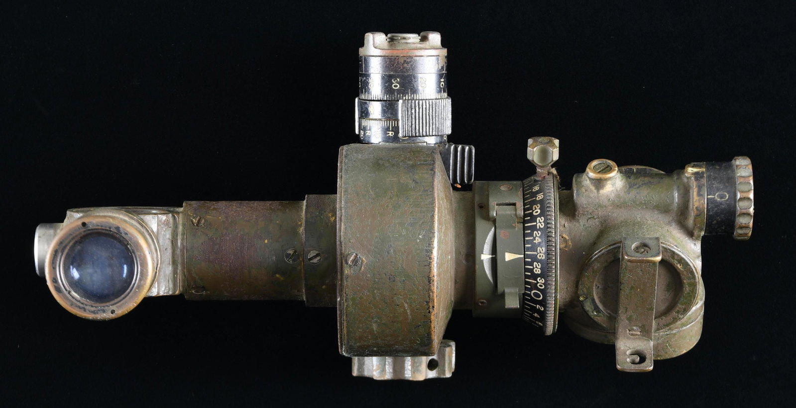 WWII US TANK SIGHT M12-A7.: A seldom-seen example of a WWII US tank sight, designated M12-A7. This sight appears to be complete, except for the eyecup, and the original paint is nearly complete. The top of the sight and the rear