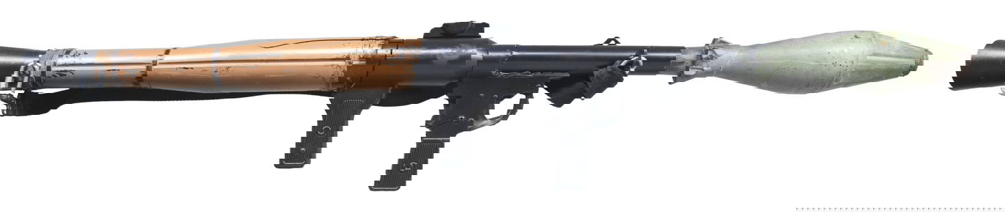 RPG-7 MOVIE PROP.: Non-firing dummy prop of the famous Soviet RPG-7 rocket propelled grenade. Prop appears to unmarked & measures 48" from tip of rocket to rear of launcher. Rocket does indeed detach. RPG features black