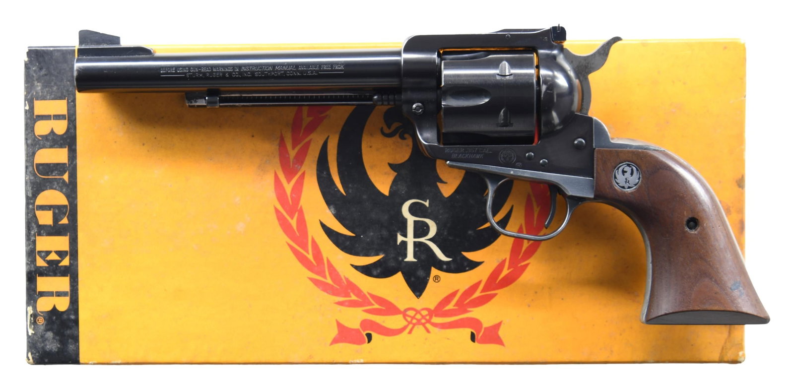 RUGER OLD MODEL BLACKHAWK REVOLVER WITH BOX.: Cal. 357 Mag. S# 94734. Mfg. 1967 as Catalog # BKH36. Replacement 6.5" barrel having Warning marks; seen on Blackhawks made 1979 & after. Serrated ramp front sight & protected square notch adj. rear s