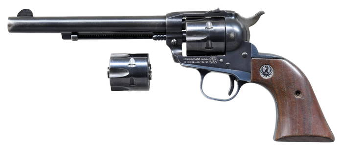 RUGER OLD MODEL SINGLE-SIX CONVERTIBLE REVOLVER.: Cal. 22 LR. / 22 Mag. S# 20-03865. Bbl. 6 1/2" with serrated 1/2 moon blade front sight; frame mounted drift adjustable rear. Mfg. 1969 (1961-1973) using XR3-RED alloy grip frame having oiled walnut g