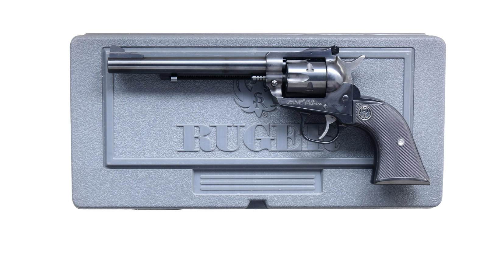 RUGER NEW MODEL SINGLE-SIX CONVERTIBLE SA REVOLVER: WITH MATCHING FACTORY BOX. Cal. .22 LR / .22 Mag. S# 264-90059. Mfg. 2007 as Model 10622; Catalog No. NR-6L. Bbl. 6.5" w/ ramp front sight & adj. rear sight.. Blued finish w/ fluted 6 shot 22 LR & 22 