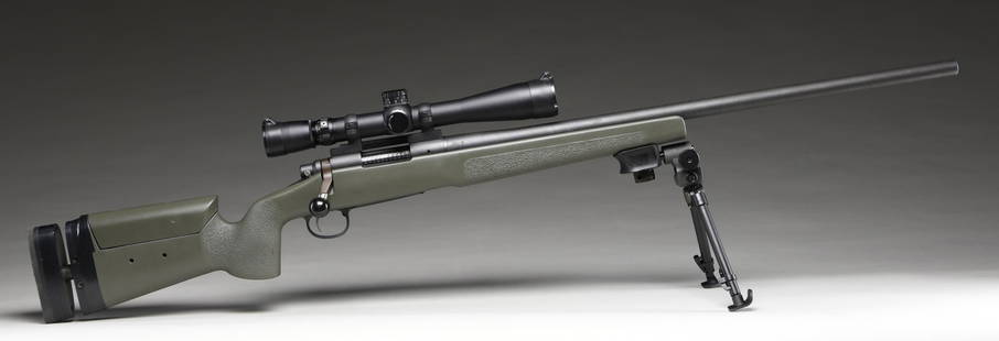 REMINGTON MODEL 700 .308 WIN. HEAVY BARREL BOLT: ACTION RIFLE. Cal. 308 Win. S# E6242798. Bbl. 26". Model 700 bolt action rifle mfg. by Remington. Bbl. and receiver show standard factory markings. Receiver, bbl., and bolt assembly exhibit a matte bl