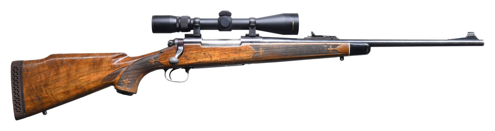 REMINGTON MODEL 700 BDL BOLT ACTION RIFLE.: Cal. 30-06. S# 27315. Bbl. 20". Ramped bead front sight. Adjustable rear sight. Nikon Prostaff 3-9x40 scope. Scope has duplex crosshair reticle & very good optics. Safety is englarged & maybe aftermar