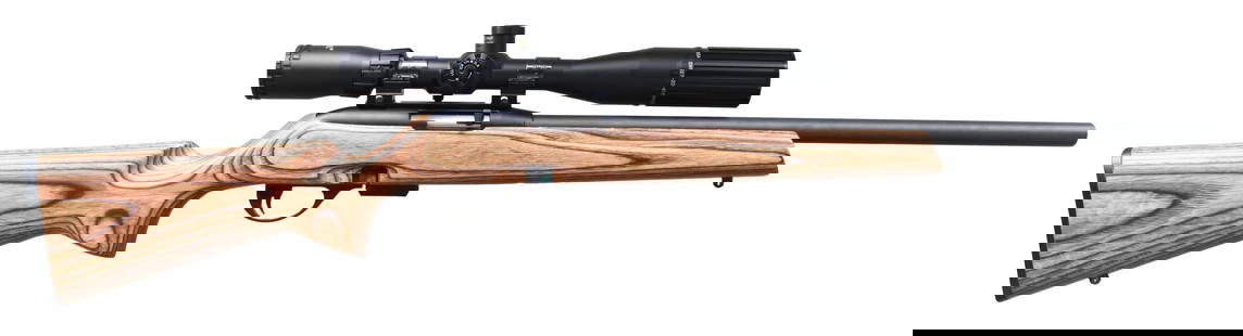 REMINGTON 597 MAGNUM SEMI AUTO RIFLE.: Cal. 22 Mag. S# B2919524M. Bbl. 20". Rifle is sighted with a BSA Sweet 22 6-18x40 scope. Scope has duplex crosshair reticle & very good optics. Lens covers also present. Front lens cover is missing it