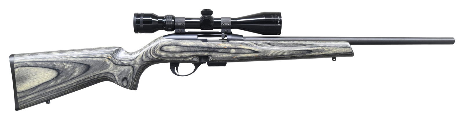 REMINGTON 597 MAGNUM SEMI AUTO RIFLE.: Cal. 17 HMR. S# 2976341M . Bbl. 20". Rifle is sighted with a Tasco World Class Plus 3-9x44 scope. Scope has duplex crosshair reticle & very good optics. Bikini scope cover present. Matte blue finish.