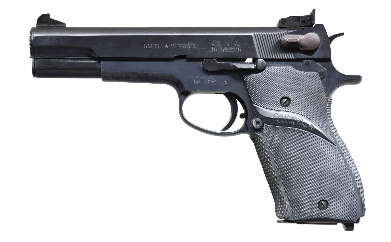 SMITH & WESSON MODEL 52-2 SEMI AUTO PISTOL.: Cal. 38 Spl. Midrange. S# TAN6225. Bbl. 5". Patridge front sight. Adjustable square notch rear sight. Target semi-auto pistol chambered in 38 Special wadcutter made in 1986-1987. Blued finish. Pachmay