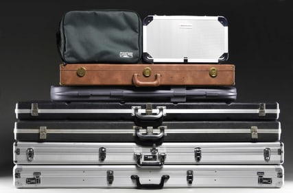 7 FIREARM CASES & CAMERA CASE.