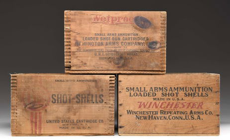 THREE ANTIQUE WOODEN SHOT SHELL CASES.