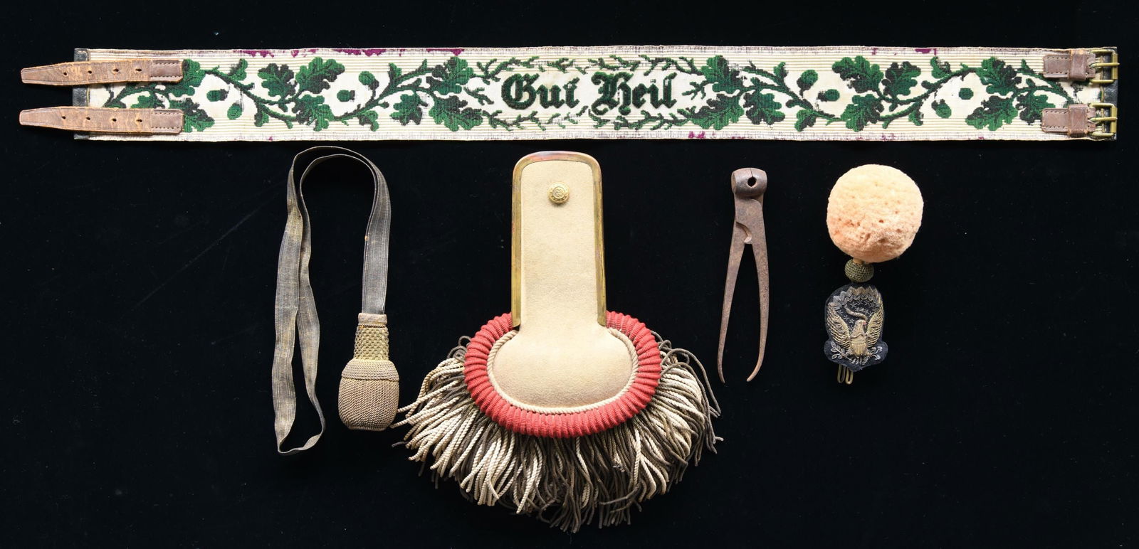 A POST CIVIL WAR EPAULETTE, PRE-WAR POM-POM,: SWORD KNOT, & MORE. This lot includes 1 militia enlisted post-war epaulette in red and white wool for the Worcester Continentals. / 1 M1851 officer's buff wool pom-pom with bullion eagle attached. Pom