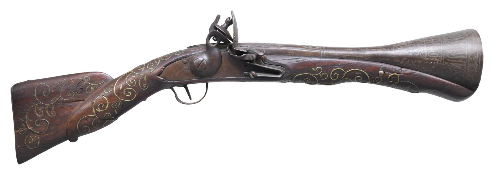 ORNATE OTTOMAN STYLE FLINTLOCK DAG BLUNDERBUSS.: 22" overall, 12" barrel flaring to massive 3" muzzle, chiseled and inset decoration, barrel is crudely lap seamed. Lock is unmarked, iron mounted with nailed trigger guard & buttplate, forged saddle r