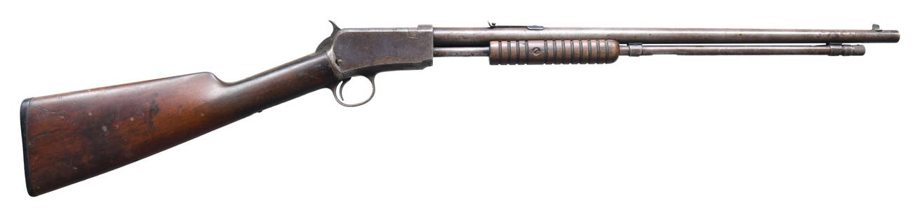 WINCHESTER MODEL 1906 SLIDE ACTION RIFLE.: Cal. 22 S, L, LR. S# 408496. Bbl. 20". Model 1906 slide action rifle mfg. by Winchester in 1914. Left side of the bbl. is marked with Winchester's mfg. and patent information, followed by "MOD 1906",