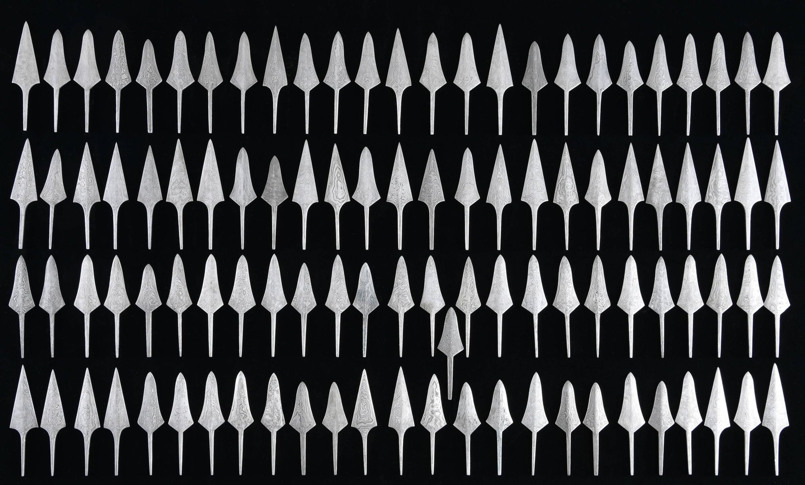 FINE DAMASCUS STEEL ARROWHEADS.: This lot contains approx. 103 exceptional arrowheads that are part of a group that were sold for years by Lewis Drake and Associates of Kentucky. They are high grade Damascus steel and were individual