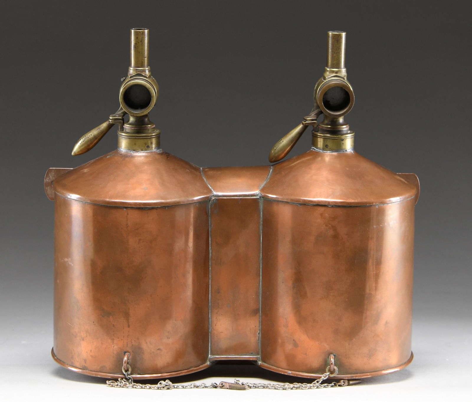 CUSTOM COPPER POWDER & SHOT WALL DISPENSER.: This piece measures approx. 12" x 12.5" x 5. The copper body appears custom made with 2 brass top lids for pouring contents into containers. Spouts appear to be modified James Dixon & Son shot measuri