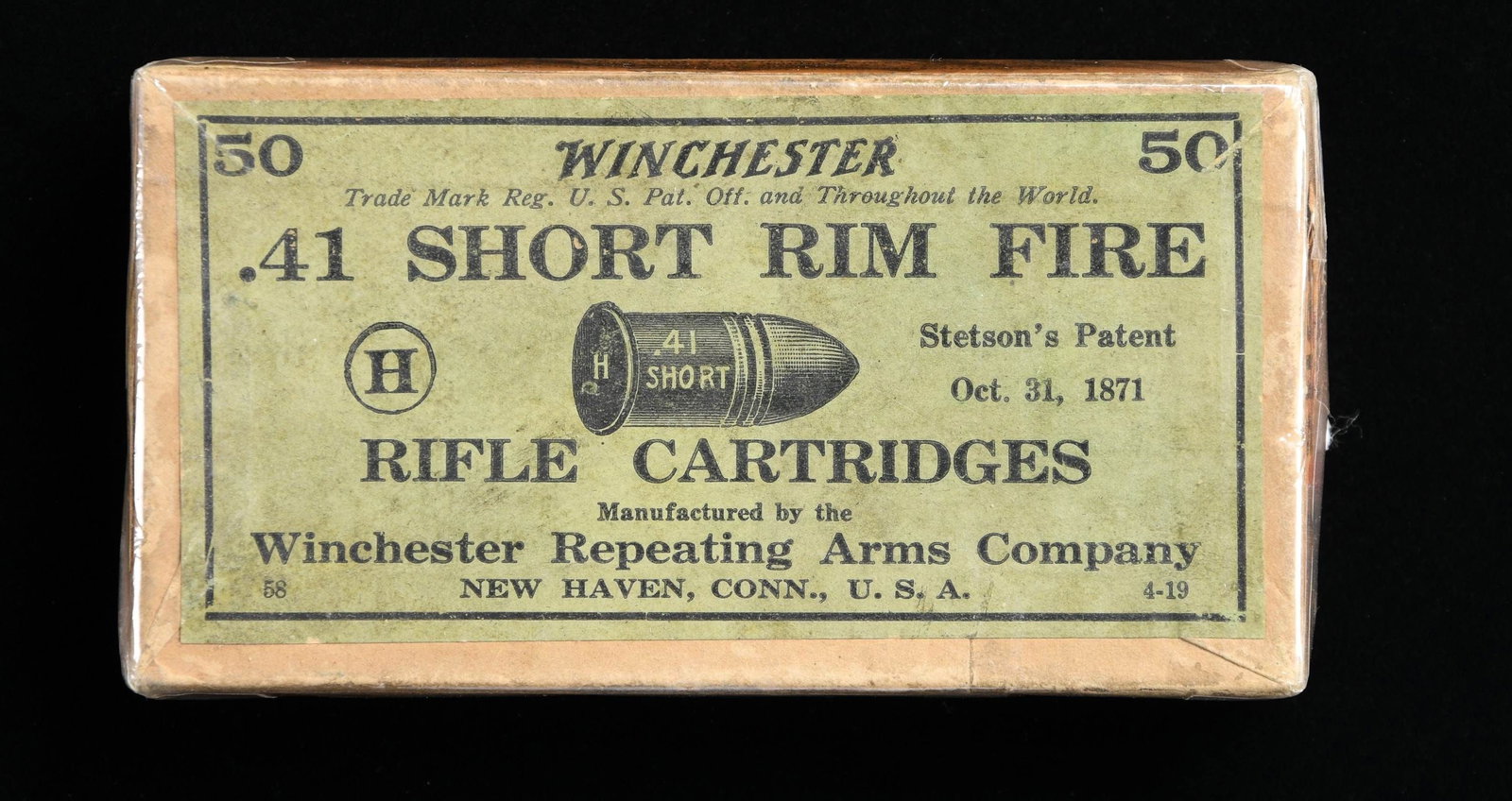 SCARCE WINCHESTER GREEN LABEL 41 RIMFIRE CARTRIDGE: PACK. Full box of 50 .41 short rimfire cartridges manufactured by "WINCHESTER REPEATING ARMS COMPANY". "STETSON'S PATENT Oct. 31, 1871" orange side labels which originally sealed box, each marked ".41