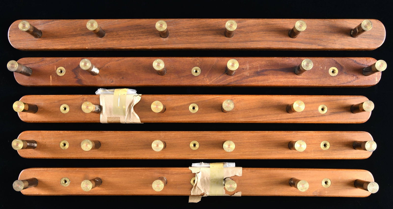 5 WALL MOUNTED PEGBOARDS.: These pegboards would be ideal for a trophy room, gun room, or man cave. They are made of fine teakwood and measure approx. 26" in length and 2" in height. Each peg protrudes 2 1/2" from the board and