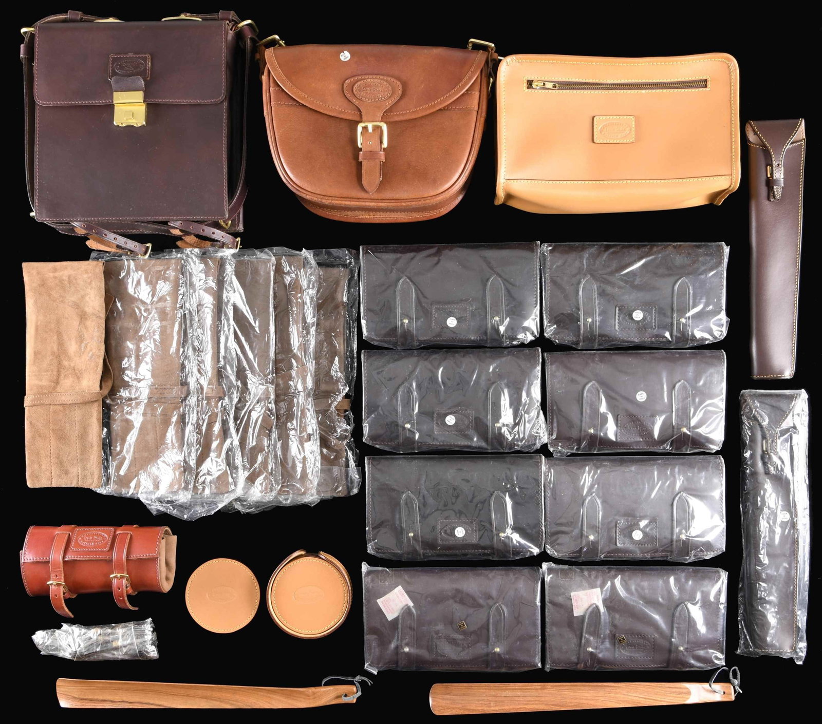 FINE QUALITY LEATHER GOODS FROM LEWIS DRAKE &: ASSOCIATES. This exceptional lot includes pieces that were once part of the inventory from the world famous hunting and safari outfitting firm of Lewis Drake and Associates. This particular lot includ