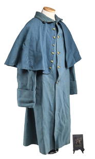 IDENTIFIED UNION GREAT COAT OF SURGEON HILAND: WEED, 17th & 25th NEW YORK. Classic sky blue single breasted overcoat with cape, one sleeve has cotton lining with contractor name and sewn cloth label covering most of it "MS / HA WEED / NYV". Hiland