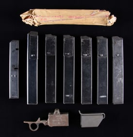 GROUPING OF 8 SUBMACHINE GUN MAGAZINES FOR STEN
