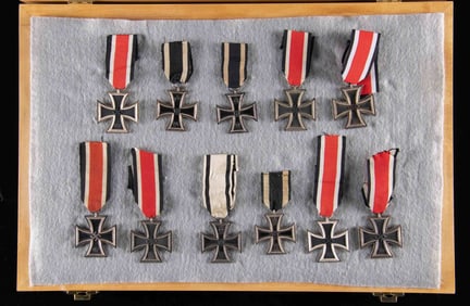 11 WWI AND WWII GERMAN 2ND CLASS IRON CROSSES.
