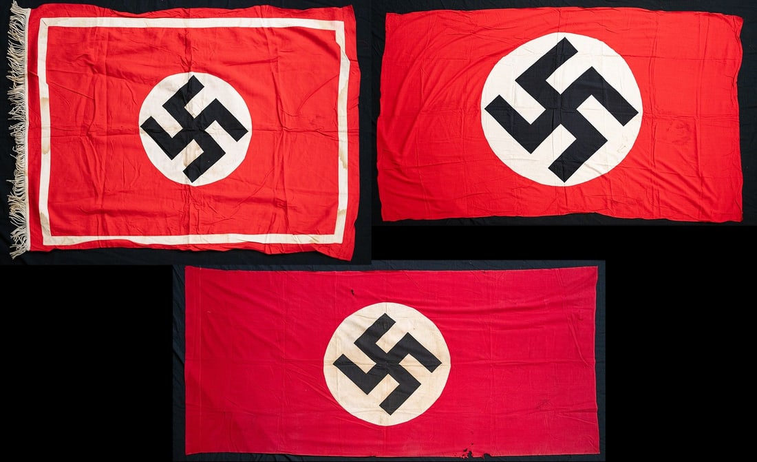 WWII GERMAN FLAGS OR BANNERS.: 1) German WWII Party flag of standard design measuring 56" x 102". 2) German WWII Party flag of standard design measuring 49" x 98". 3) German WWII Party banner measuring 30" x 39" not including 2" of