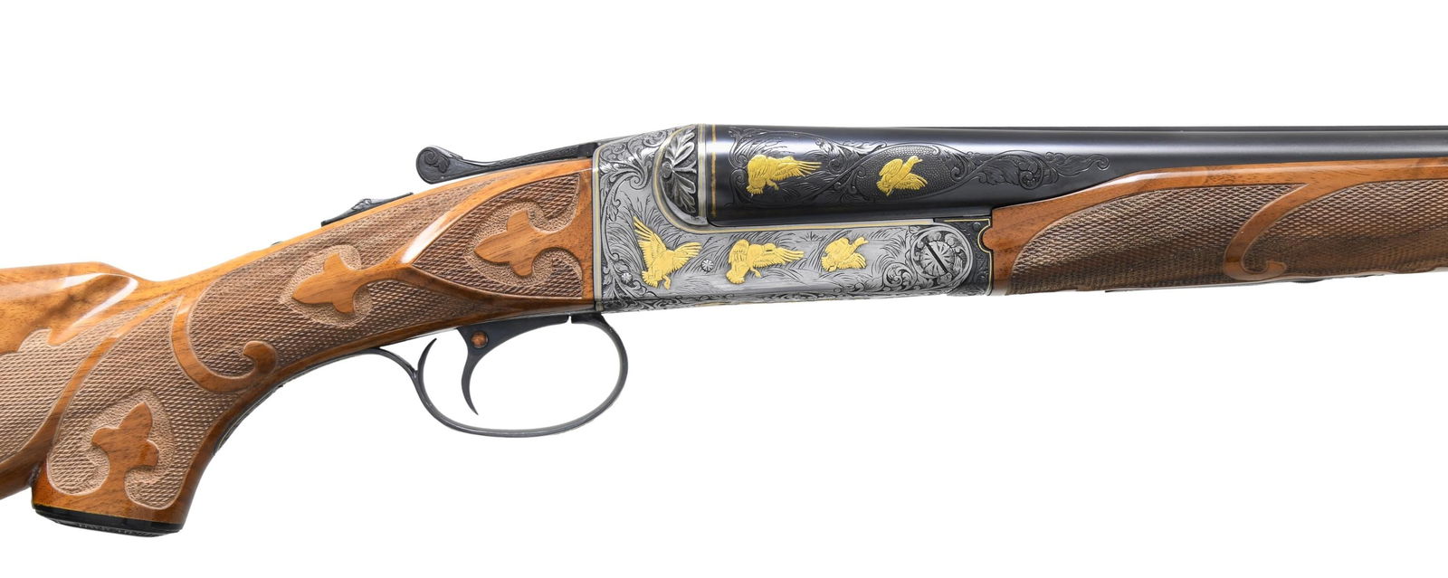 CECIL J. MILLS CUSTOM ENGRAVED WINCHESTER MODEL 21: SKEET SXS SHOTGUN. Cal. 12 GA, 2 3/4". S#. 20990. Bbl. 26", with fixed WS-1 and WS-2 chokes. Brass front bead, with ivory mid bead. Flat sided boxlock action, with full coverage custom engraving. Gold