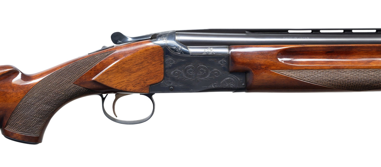 WINCHESTER MODEL 101 SKEET O/U SHOTGUN.: Cal. 12 ga. 2 3/4". S#. K172590. Bbl.. 26" vent rib w/ brass front & mid beads. Fixed Skeet & Skeet chokes. Blued boxlock action features scroll ornamentation, ejectors & single selective trigger. Fin