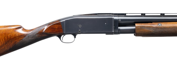 CUSTOMIZED REMINGTON MODEL 10-T PUMP SHOTGUN.