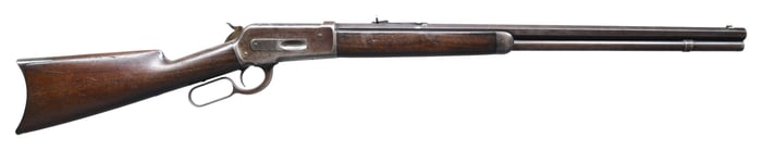WINCHESTER MODEL 1886 LEVER ACTION RIFLE.