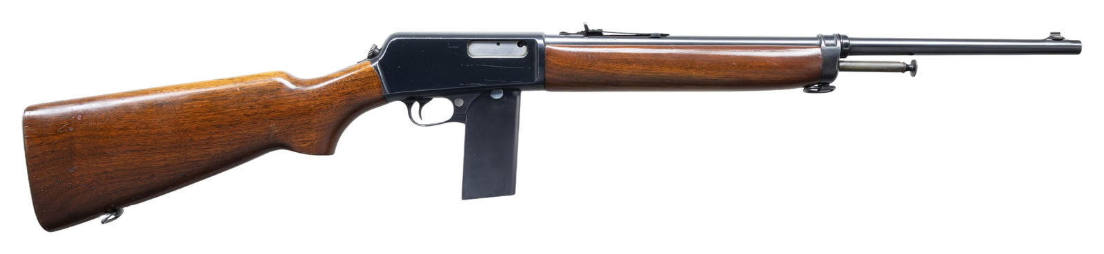 WINCHESTER MODEL 1907 SELF-LOADING RIFLE WITH: AMMUNITION. Cal. 351 SL. S# 47913. Bbl. 20" rnd. Ramp mounted Lyman brass bead front sight with original sporting rear sight. Blue finish. Walnut forearm and pistol grip stock with checkered steel but