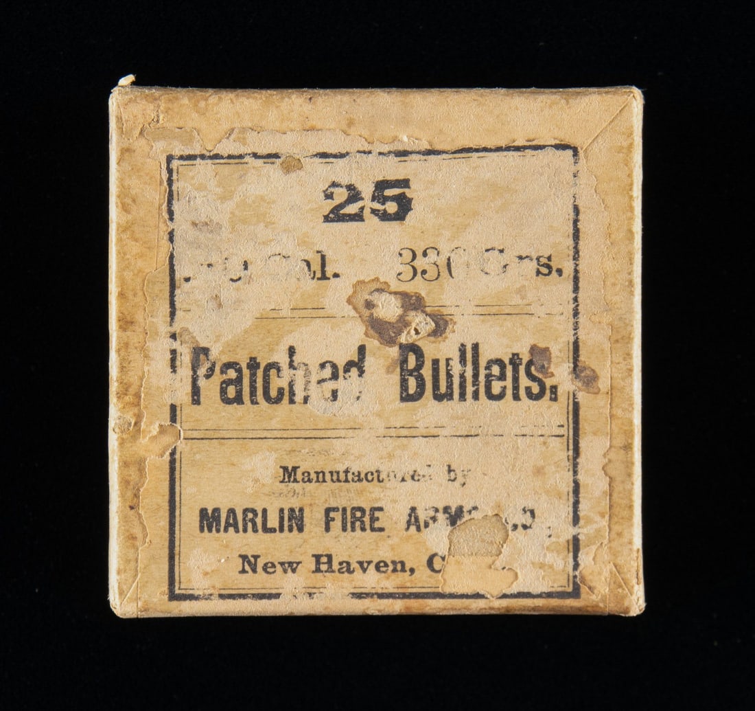 ANTIQUE BOX OF MARLIN 40 CAL. 330 GRS. PATCHED: BULLETS. Full brown box of 25 paper patched bullets. CONDITION: box in good overall with lower box having clear tape reinforcement to corners & labels being torn & partially discernable. (02-25094/MD)