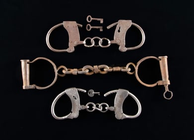 THREE SETS OF VINTAGE HANDCUFFS.