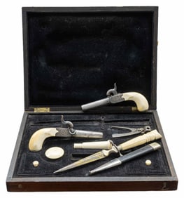 ELEGANT CASED IVORY MOUNTED CASED PERCUSSION