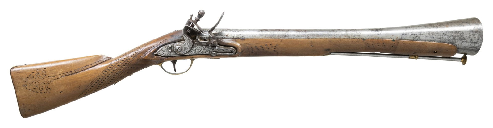 FUNCTIONAL 19TH CENTURY OTTOMAN FLINTLOCK: BLUNDERBUSS. Cal. 1". NSN. 33" overall, 20" barrel flares to 2.5" bell, engraved brass furniture, nailed buttplate, full stock with carved design. CONDITION: good overall, stock broken and repaired th