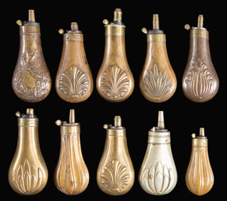 TEN DECORATED PISTOL POWDER FLASKS.