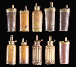 TEN MULTI-COMPARTMENT PISTOL FLASKS FOR POWDER,