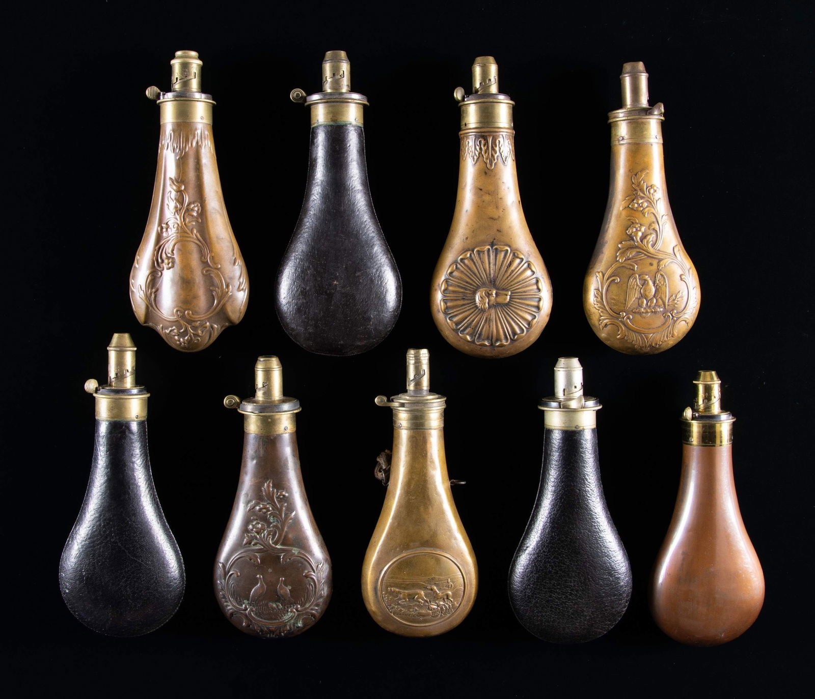 NINE BRITISH MAKER MARKED RIFLE & SHOTGUN POWDER: FLASKS. Flasks are all about 8", 3 are Snider marked with rifle logo, 4 are "BARTRAM & CO-EXTRA QUALITY" marked, 2 are early "JAMES BARLOW &CO-IMPROVED PATENT" marked. CONDITION: good to very good ove